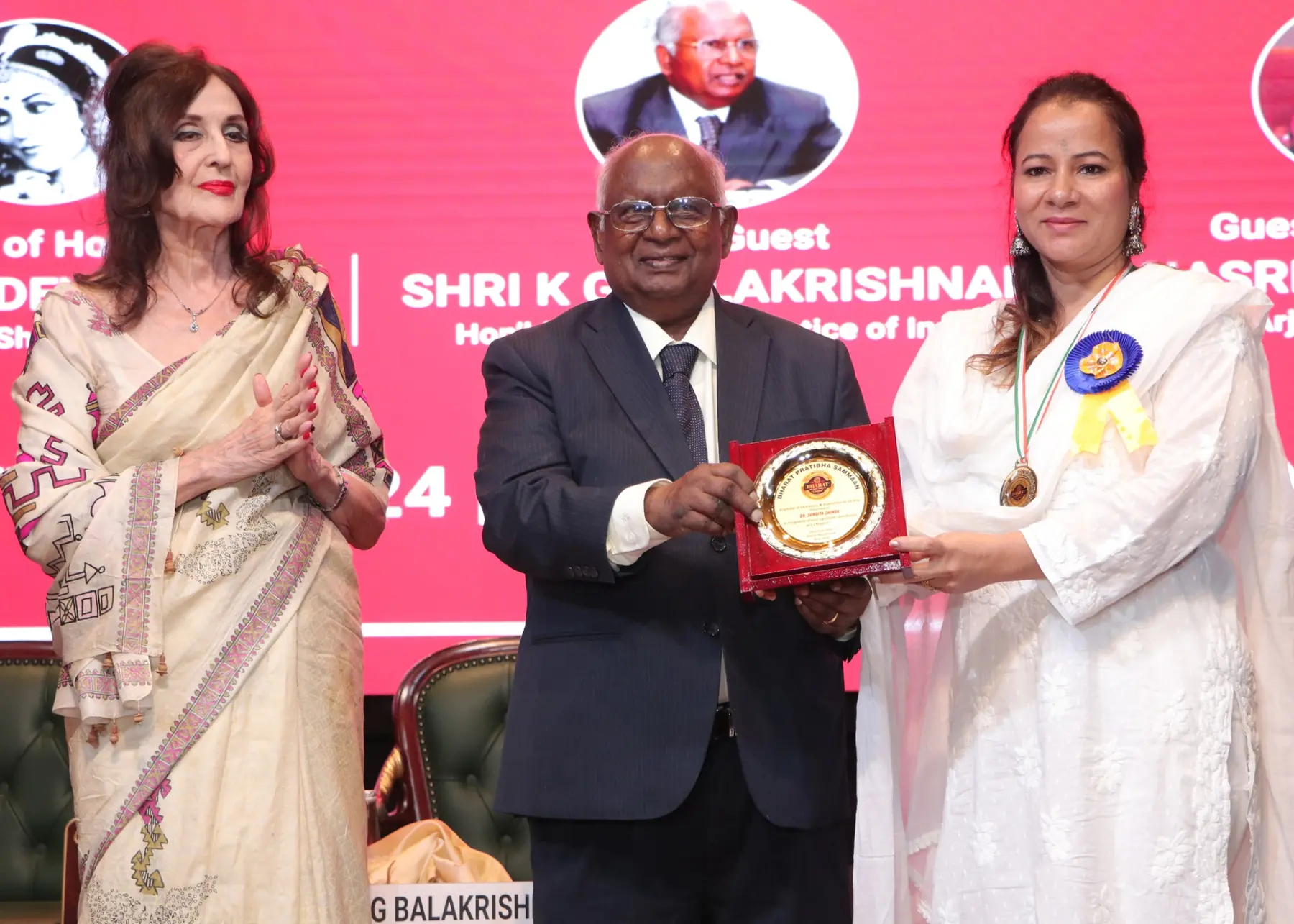 OMT Sangita Shinde receiving a professional award